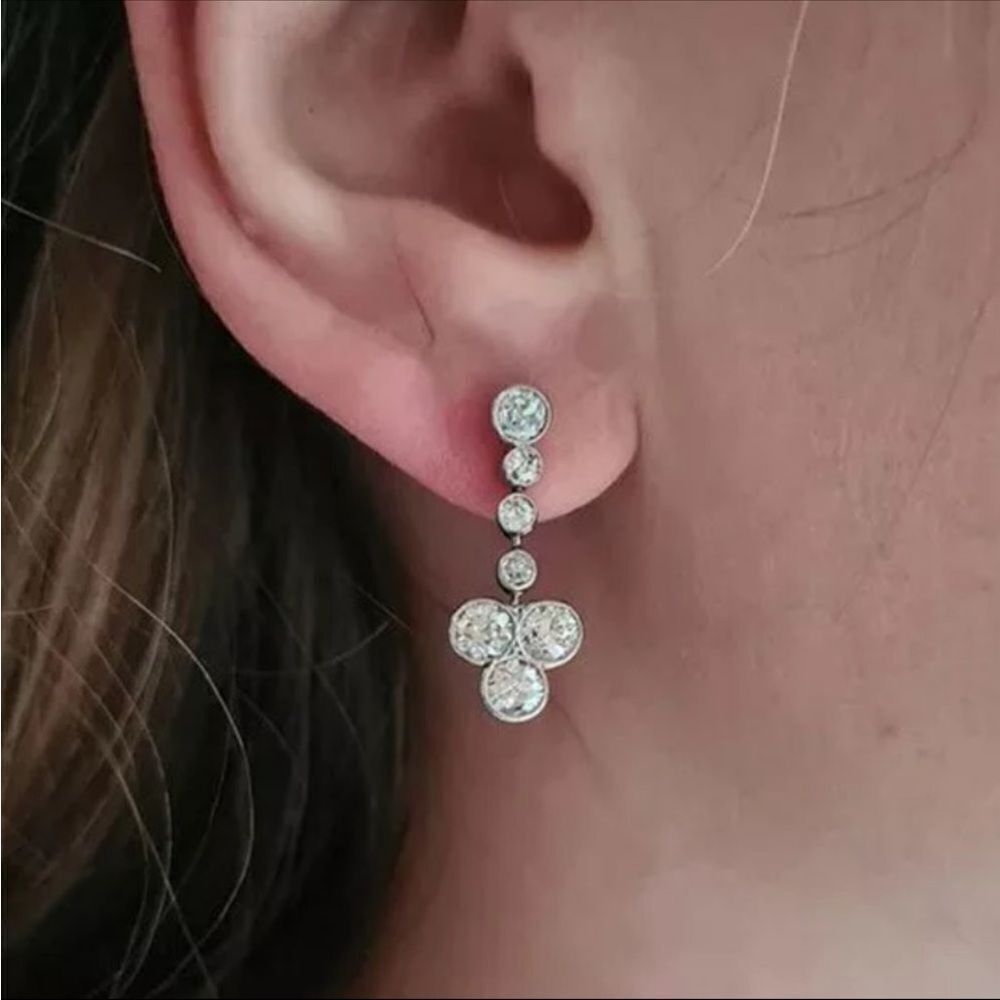The Reverse T Dangle Drop Statement earrings in silver and cubic zirconia